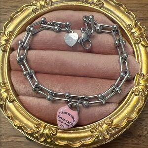 Tiffany & Co. Silver Bracelet with Pink Heart Charm